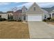 Charming single-Gathering home with a two-car garage and well-maintained landscaping at 3905 Delfaire Trce, Cumming, GA 30040