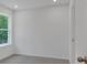Bedroom with natural light streaming through the large window at 372 Waterbluff Dr, Mableton, GA 30126