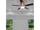 Bedroom with ceiling fan and bright window light at 372 Waterbluff Dr, Mableton, GA 30126