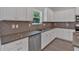 Well-appointed kitchen with stainless steel appliances, granite counters, and ample cabinet space at 372 Waterbluff Dr, Mableton, GA 30126