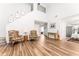 Open concept living room with hardwood floors, high ceilings, and plenty of natural light at 2485 Field Spring Dr, Stonecrest, GA 30058
