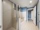 Bathroom featuring a glass-enclosed shower, soaking tub, and access to the toilet area at 3338 Peachtree Ne Rd # 2804, Atlanta, GA 30326