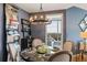 Inviting dining area featuring a modern chandelier and city views, creating an ideal ambiance for meals at 3338 Peachtree Ne Rd # 2804, Atlanta, GA 30326
