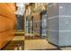 Hallway with wooden panels and elevators at 3338 Peachtree Ne Rd # 2804, Atlanta, GA 30326