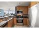 Kitchen features stainless steel appliances and granite countertops at 3338 Peachtree Ne Rd # 2804, Atlanta, GA 30326