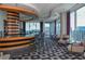 Resident lounge area featuring modern chairs and unique striped pillar design with a city view at 3338 Peachtree Ne Rd # 2804, Atlanta, GA 30326