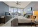 Bright main bedroom with city views, access to a balcony, and comfortable furnishings at 3338 Peachtree Ne Rd # 2804, Atlanta, GA 30326