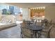 Relaxing outdoor patio features lounge chairs, dining tables, and outdoor grill at 3338 Peachtree Ne Rd # 2804, Atlanta, GA 30326