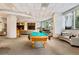 Spacious recreation room featuring a pool table and comfortable lounge seating at 3338 Peachtree Ne Rd # 2804, Atlanta, GA 30326