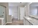 Bright bathroom featuring a granite countertop, shower, and separate soaking tub at 344 Springbottom Ct, Lawrenceville, GA 30046