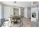 Dining room connected to the kitchen with adjacent laundry space at 344 Springbottom Ct, Lawrenceville, GA 30046