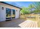 Inviting backyard deck featuring wooden decking and railings perfect for outdoor relaxation and entertainment at 116 Carroll St, Temple, GA 30179