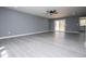 Spacious open concept living room with light flooring and abundant natural light at 116 Carroll St, Temple, GA 30179