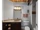 Well-lit bathroom showcasing a sleek vanity, modern fixtures, and a bathtub with stylish tile at 170 Boulevard Se # 104E, Atlanta, GA 30312