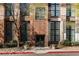 Building entrance featuring brick facade with large windows and beautiful landscaping around the walkway at 170 Boulevard Se # 104E, Atlanta, GA 30312
