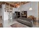 Bright living room with a spiral staircase, open to dining and kitchen area, and a large window at 170 Boulevard Se # 104E, Atlanta, GA 30312