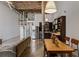 A stylish living space featuring a spiral staircase, modern kitchen, and high ceilings at 170 Boulevard Se # 104E, Atlanta, GA 30312