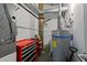 Functional utility room with a water heater, tool storage, and maintenance equipment at 170 Boulevard Se # 104E, Atlanta, GA 30312