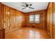 Bedroom with beautiful wood paneling, hardwood floors, and a window to allow for natural light at 2696 Dodson Dr, East Point, GA 30344