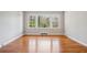 Spacious living room with hardwood floors, and ample natural light at 2696 Dodson Dr, East Point, GA 30344