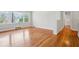 Inviting living room boasting hardwood floors, natural light, and freshly painted neutral walls at 2696 Dodson Dr, East Point, GA 30344
