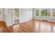 Living room with hardwood floors, neutral walls, and natural light, offering a serene space at 2696 Dodson Dr, East Point, GA 30344