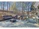 Inviting back deck with comfortable wicker furniture, perfect for relaxation and outdoor enjoyment at 3222 Pagoda Trce, Lawrenceville, GA 30043