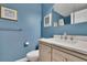 Stylish powder room with marble countertops, a vanity, and a toilet at 3222 Pagoda Trce, Lawrenceville, GA 30043