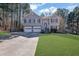 Charming two-story home with well-maintained landscaping and a two-car garage at 3222 Pagoda Trce, Lawrenceville, GA 30043