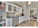 View of the kitchen sink area, with view to the dining area through the door at 3222 Pagoda Trce, Lawrenceville, GA 30043