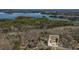 This aerial view highlights the proximity to the serene lake and picturesque lakeside community at 7025 Bavarian Wood Pl, Buford, GA 30518