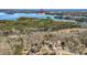 This aerial view highlights the proximity to Lake Lanier and picturesque lakeside community at 7025 Bavarian Wood Pl, Buford, GA 30518