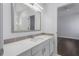 Bathroom with a modern sink, large mirror, and stylish backsplash at 7025 Bavarian Wood Pl, Buford, GA 30518