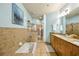 Relaxing bathroom with a separate tub and shower, dual sinks, and a granite countertop at 711 Cosmopolitan Ne Dr # 523, Atlanta, GA 30324