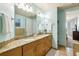 Spacious bathroom with dual sinks, granite countertops, and plenty of counter space at 711 Cosmopolitan Ne Dr # 523, Atlanta, GA 30324