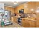 Close-up of the kitchen area featuring stainless appliances, granite countertops, and modern backsplash at 711 Cosmopolitan Ne Dr # 523, Atlanta, GA 30324