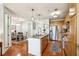 Open-concept kitchen with stainless steel appliances, granite countertops, and hardwood flooring, ideal for entertaining at 711 Cosmopolitan Ne Dr # 523, Atlanta, GA 30324