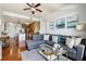 Bright living room features hardwood floors, modern decor, and a comfortable gray sectional sofa at 711 Cosmopolitan Ne Dr # 523, Atlanta, GA 30324