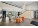 Expansive lobby with modern decor, stylish seating, and a grand staircase at 711 Cosmopolitan Ne Dr # 523, Atlanta, GA 30324