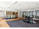 Open lounge area featuring a grand piano, modern bar, and ample seating at 711 Cosmopolitan Ne Dr # 523, Atlanta, GA 30324