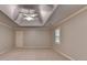 Comfortable bedroom with neutral walls, a ceiling fan, carpet floors, and natural light at 10835 Tuxford Dr, Alpharetta, GA 30022
