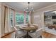 Cozy breakfast nook with wainscoting and natural light at 10835 Tuxford Dr, Alpharetta, GA 30022