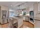 Bright kitchen with stainless steel appliances and granite countertops at 10835 Tuxford Dr, Alpharetta, GA 30022