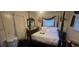 Tranquil bedroom with a four-poster bed, offering a serene retreat at 2572 Tyler Way, Decatur, GA 30032