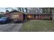 Charming single-story brick home with a cozy front porch and well-maintained lawn at 2572 Tyler Way, Decatur, GA 30032