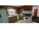 Functional kitchen design with ample cabinet space and standard appliances at 2572 Tyler Way, Decatur, GA 30032