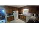 Functional kitchen design with ample cabinet space and standard appliances at 2572 Tyler Way, Decatur, GA 30032