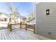 Wooden back deck of a home overlooking the neighborhood with wood fencing at 585 Sherwood Ne Rd, Atlanta, GA 30324