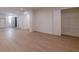 Open basement with hardwood floors and walk-in closet space at 585 Sherwood Ne Rd, Atlanta, GA 30324