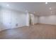 Finished basement with light-colored flooring and recessed lighting at 585 Sherwood Ne Rd, Atlanta, GA 30324